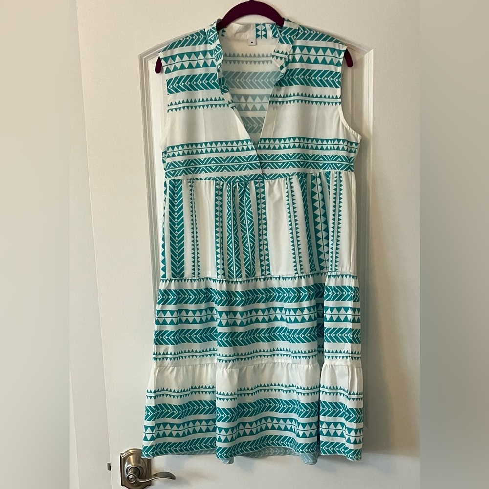 Women’s Cute turquoise and white dress for beach or play. Size M but runs large